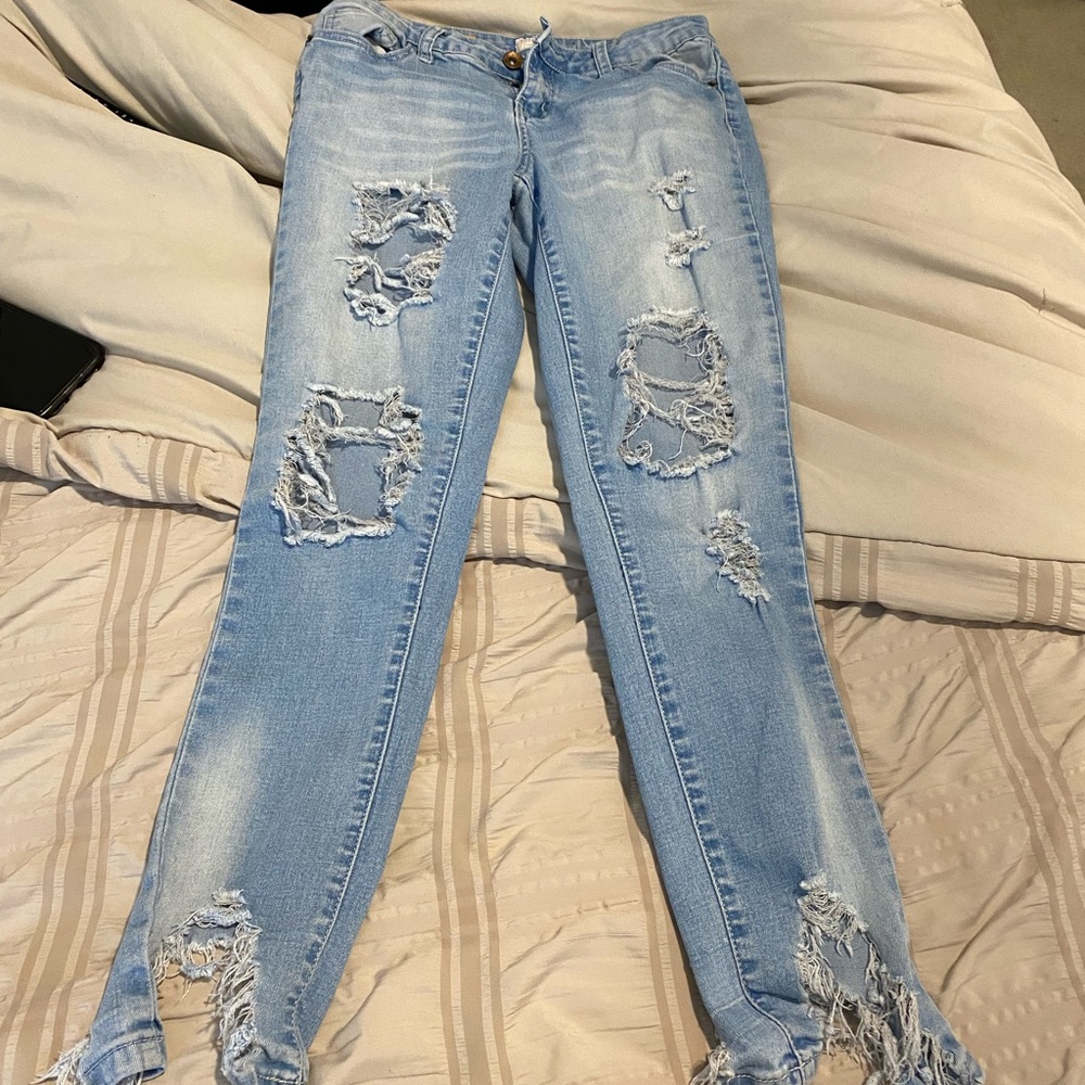 Ripped ankle jeans